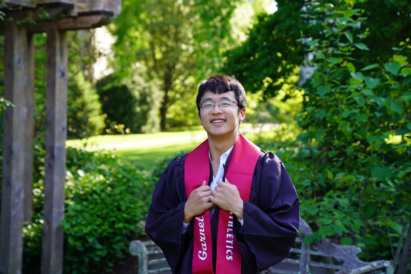 Howard Wang graduation with Garnet stole
